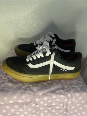 Vans Black Canvas Low-Top Sneakers with White Stripe and Gum Sole